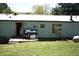 Exterior view with a metal roof and door, enhanced by bright natural light at 31 Dogwood Nw Ln, Cartersville, GA 30121