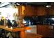 Functional kitchen space with wood cabinets, range, and decorative accents at 31 Dogwood Nw Ln, Cartersville, GA 30121