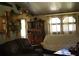 Inviting living room featuring a comfortable sofa, natural light, and eclectic decor at 31 Dogwood Nw Ln, Cartersville, GA 30121