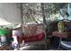 Relaxing porch with wicker furniture and floral cushions, perfect for enjoying the outdoors at 31 Dogwood Nw Ln, Cartersville, GA 30121