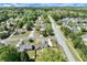 Aerial view of the neighborhood, with the house perfectly positioned in the community and surrounded by lush greenery at 1337 Highfield Dr, Lawrenceville, GA 30043
