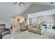 Open-concept living room with views of the dining area and modern furnishings at 1337 Highfield Dr, Lawrenceville, GA 30043