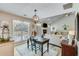 Bright and open living room with a fireplace, vaulted ceiling, and an adjacent office space at 1337 Highfield Dr, Lawrenceville, GA 30043