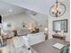Spacious living room with vaulted ceilings, a ceiling fan, and neutral décor providing a cozy feel at 1337 Highfield Dr, Lawrenceville, GA 30043