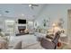 Bright living room featuring a fireplace, plush seating, and stylish decor at 1337 Highfield Dr, Lawrenceville, GA 30043