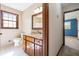 Bright bathroom featuring a vanity with granite counters and tile flooring at 2062 Skyhawk Ln, Acworth, GA 30102