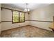 Dining room featuring decorative wallpaper, chair rail, and large window at 2062 Skyhawk Ln, Acworth, GA 30102