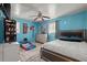 Comfortable bedroom featuring ceiling fan, plush carpet, and a modern bed frame with a padded headboard at 2844 Whispering Hills Dr, Chamblee, GA 30341