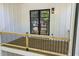 The balcony has a wood floor and a metal railing, offering an inviting outdoor retreat at 4785 Longchamps Dr, Sandy Springs, GA 30319