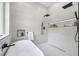 Modern bathroom with soaking tub and sleek black fixtures at 4785 Longchamps Dr, Sandy Springs, GA 30319