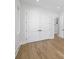 Bedroom with hardwood floors and a closet in the background at 4785 Longchamps Dr, Sandy Springs, GA 30319