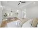 Bright bedroom featuring recessed lighting, comfortable seating, and hardwood floors at 4785 Longchamps Dr, Sandy Springs, GA 30319