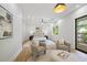 Bright bedroom featuring recessed lighting, comfortable seating, and natural light from a window at 4785 Longchamps Dr, Sandy Springs, GA 30319