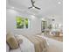 Bright bedroom featuring recessed lighting and a seating area with comfortable chairs and ottoman at 4785 Longchamps Dr, Sandy Springs, GA 30319