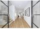 Bright foyer with hardwood floors, white walls, and views to the staircase and living room at 4785 Longchamps Dr, Sandy Springs, GA 30319
