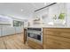 Open kitchen layout with stainless steel oven and seamless access to the living room at 4785 Longchamps Dr, Sandy Springs, GA 30319
