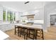 Spacious kitchen with hardwood floors, a large island, stainless steel appliances, and ample natural light at 4785 Longchamps Dr, Sandy Springs, GA 30319