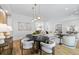 Open concept with modern dining area, lighting, and comfortable living space at 4785 Longchamps Dr, Sandy Springs, GA 30319