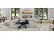 Living room with modern fireplace, natural lighting, and stylish furniture at 4785 Longchamps Dr, Sandy Springs, GA 30319