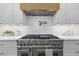 The stainless steel double oven is the focal point of this kitchen at 4785 Longchamps Dr, Sandy Springs, GA 30319