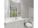 Bathroom with vanity, toilet, and shower-tub combination at 4912 Waters Edge Trl, Roswell, GA 30075