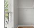 Well-lit closet with shelving for organized storage at 4912 Waters Edge Trl, Roswell, GA 30075