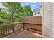 Outdoor deck overlooks lush backyard, offering a private and serene space for outdoor living and entertaining at 4912 Waters Edge Trl, Roswell, GA 30075