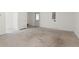Spacious garage with ample room for parking and storage at 4912 Waters Edge Trl, Roswell, GA 30075