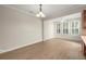 Open concept living space with new floors and large windows for ample sunlight, perfect for entertaining and gatherings at 4912 Waters Edge Trl, Roswell, GA 30075