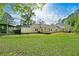 Large yard features a lawn and two homes, one with a satellite dish at 1170 Moseley Rd, Stockbridge, GA 30281