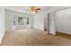 Bright bedroom with bay windows, neutral carpet and closet organizers at 1170 Moseley Rd, Stockbridge, GA 30281