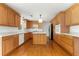 Functional kitchen featuring an island, stainless steel appliances and wooden cabinetry creating a practical and stylish space at 1170 Moseley Rd, Stockbridge, GA 30281