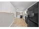 Well-lit kitchen with modern appliances and white cabinets at 4861 Alcan Rd, Powder Springs, GA 30127