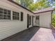Home exterior showcasing the siding, windows, shutters, and door at 5201 Skyline Dr, Stone Mountain, GA 30083