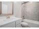 Bathroom featuring a tub, shower, tiled wall, and a vanity with a framed mirror at 811 Corsiglia Farm, Marietta, GA 30060