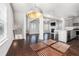 Light-filled living space with an open floor plan, seamlessly connecting the living room, kitchen, and staircase at 811 Corsiglia Farm, Marietta, GA 30060