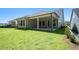 Spacious backyard with a covered patio, perfect for outdoor entertaining at 2013 Ripple Park Bnd, Canton, GA 30114