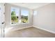 Bright, airy bedroom with large windows and hardwood floors at 2013 Ripple Park Bnd, Canton, GA 30114