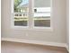 A bedroom with windows to the backyard at 2013 Ripple Park Bnd, Canton, GA 30114