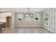 Dining area with large windows that provide natural light and a view of the surroundings at 2013 Ripple Park Bnd, Canton, GA 30114