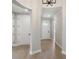 A bright foyer with light walls, light wood floors and natural light at 2013 Ripple Park Bnd, Canton, GA 30114