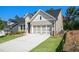 Attractive home with a well-maintained lawn and an attached two-car garage at 2013 Ripple Park Bnd, Canton, GA 30114