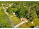 Aerial view of home showcasing a large lot surrounded by mature trees in a quiet neighborhood at 2014 Anchor Way, Buford, GA 30518