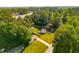 Aerial view of home and lot, with a peek at the local shopping area in a quiet neighborhood at 2014 Anchor Way, Buford, GA 30518