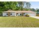 Charming single-story home with stone accents, attached garage, and well-manicured lawn at 2014 Anchor Way, Buford, GA 30518