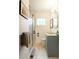 Bathroom includes a glass enclosed shower, tiled floors, and modern fixtures at 400 Collier Rd, Atlanta, GA 30309