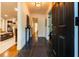 Inviting entryway with dark marble floors and views into the home's living spaces at 400 Collier Rd, Atlanta, GA 30309