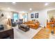 Bright and inviting living room with hardwood floors, seating, and stylish furnishings at 400 Collier Rd, Atlanta, GA 30309