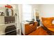 Functional home office featuring built-in shelves, modern furniture, and ample storage at 400 Collier Rd, Atlanta, GA 30309