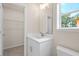 Bathroom featuring modern sink and closet at 5443 Blossomwood Sw Trl, Mableton, GA 30126